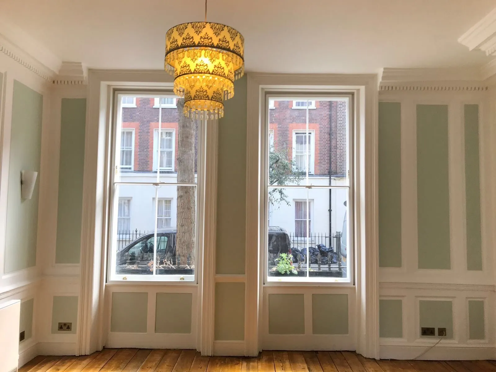 Slim aluminium secondary glazing fitted behind original period sash windows